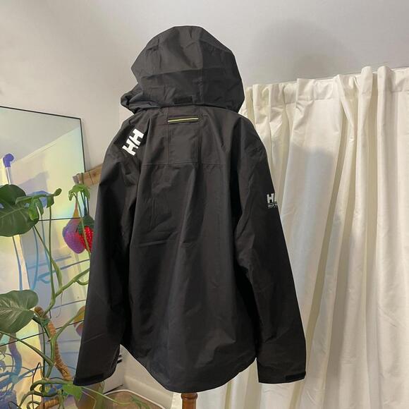 Black Helly Hansen waterproof jacket with hood size large - Picture 6 of 8
